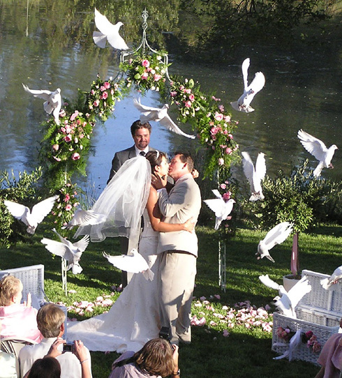 For an outdoor wedding releases are normally done at the end of the 